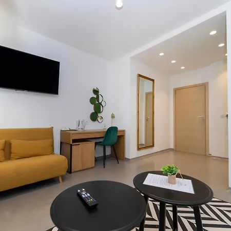 White By Belmont Realty Apartment